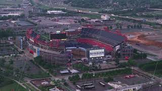 Aerial view of Nissan stadium in Nashville, Tennessee, with surrounding parking lots and