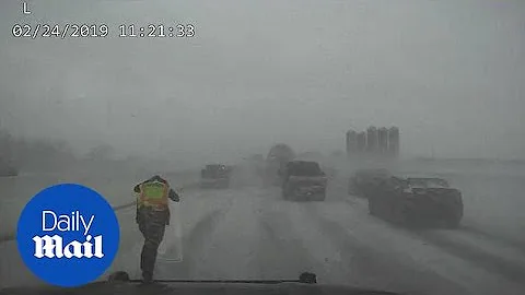 Whiteout conditions cause massive 131-car pileup i...