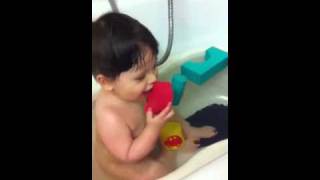 Noah bathtime fun with Mommy and Daddy