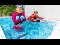 I FROZE MY SWIMMING POOL WITH 7,000 POUNDS OF ICE!!