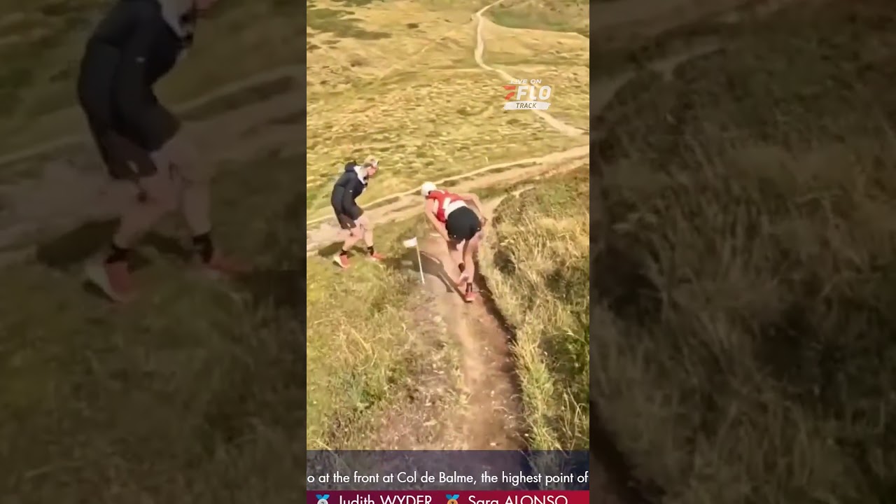 BIG FALL for our leader! Naomi Lang takes a spill shortly after the Col de Balme aid station.
