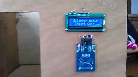 System keamanan rumah berbasis RFID & SMS Gateway