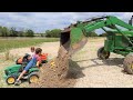 Playing in the dirt and getting stuck in the mud | Tractors for kids