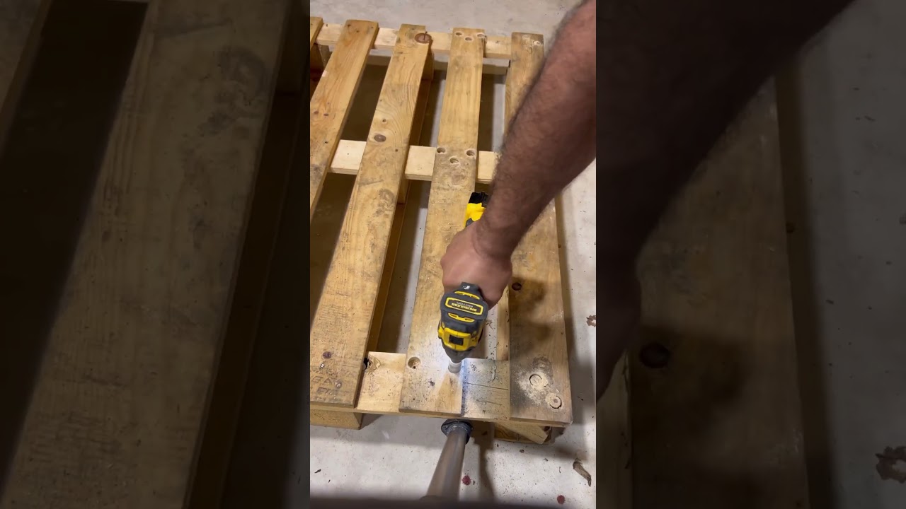 Taking apart a pallet without splitting the wood using an small hole saw. 