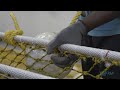 Processus de montage d'un chalut de pêche.