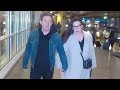 Sweet couple liv tyler and dave gardner holding hands at lax