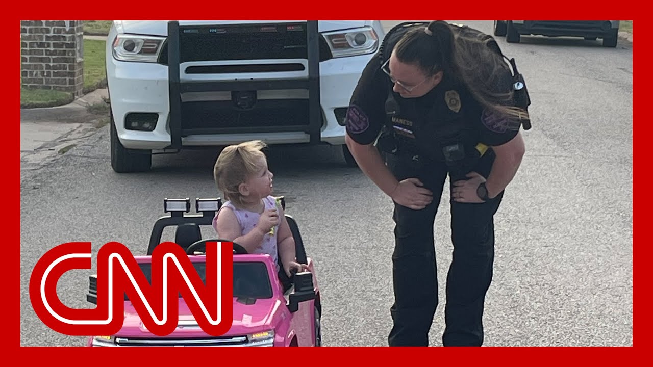 She wasnt too interested in talking Cop pulls over toddler