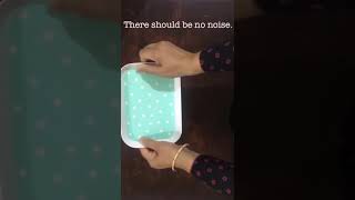 Montessori Activities. Holding of a tray and spoon.