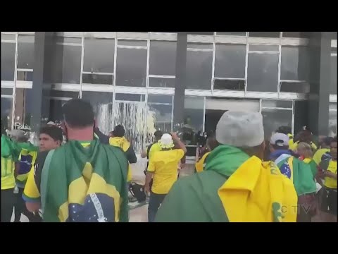Supporters of ex-president Jair Bolsonaro storm Brazil's Congress