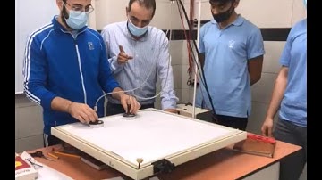 Collision of two pucks on an air table-Experiment