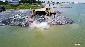 A proficient wheel loader operator with advanced skills Pushing and Moving stone for build New Road!