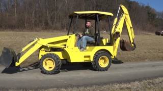 PREDATOR 425 4X4 TRACTOR WITH LOADER AND BACKHOE