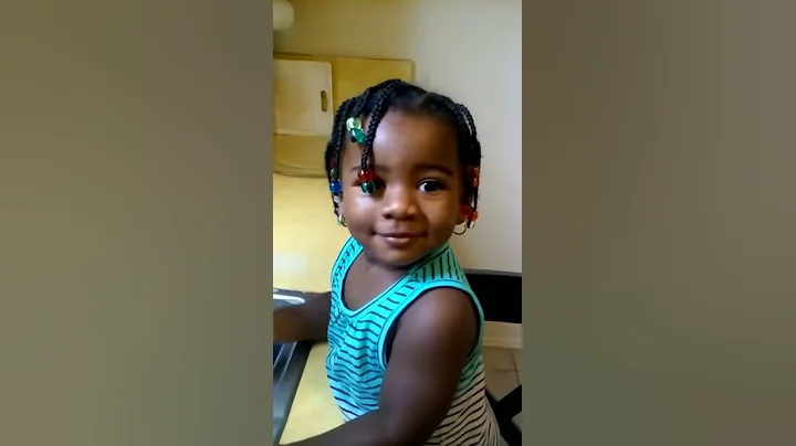 My grandbaby washing dishes