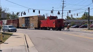 Strangest Railroad Crossing Ever!  Caboose Leads Train Across, Conductor Flags Traffic