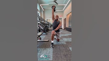 Half Kneeling KB Overhead Thoracic Rotation Opener