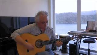 Issa Molina - Playing Guitar Accompanied By A Captivating Landscape.