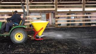 Applying MAG Flake Indoor Arena Dust Control