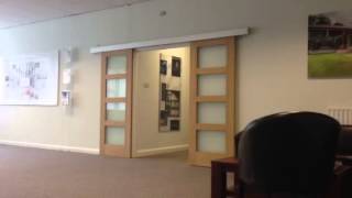 Quick glimpse: Evolve by P C Henderson - Automated Sliding Door Hardware