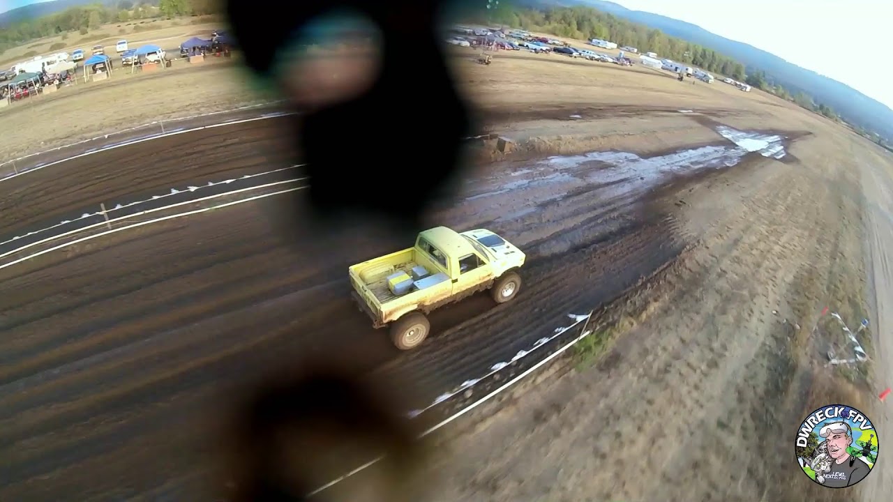 FPV Chasing Mud Trucks Covered in Mud