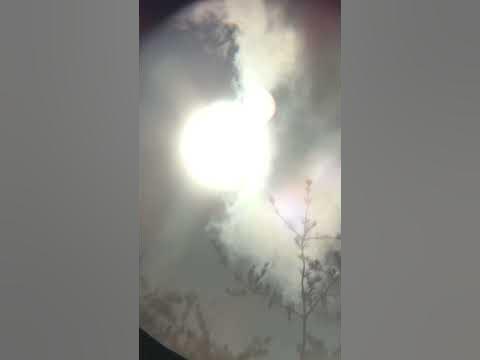 Sun traveling through the clouds with second sun. - YouTube