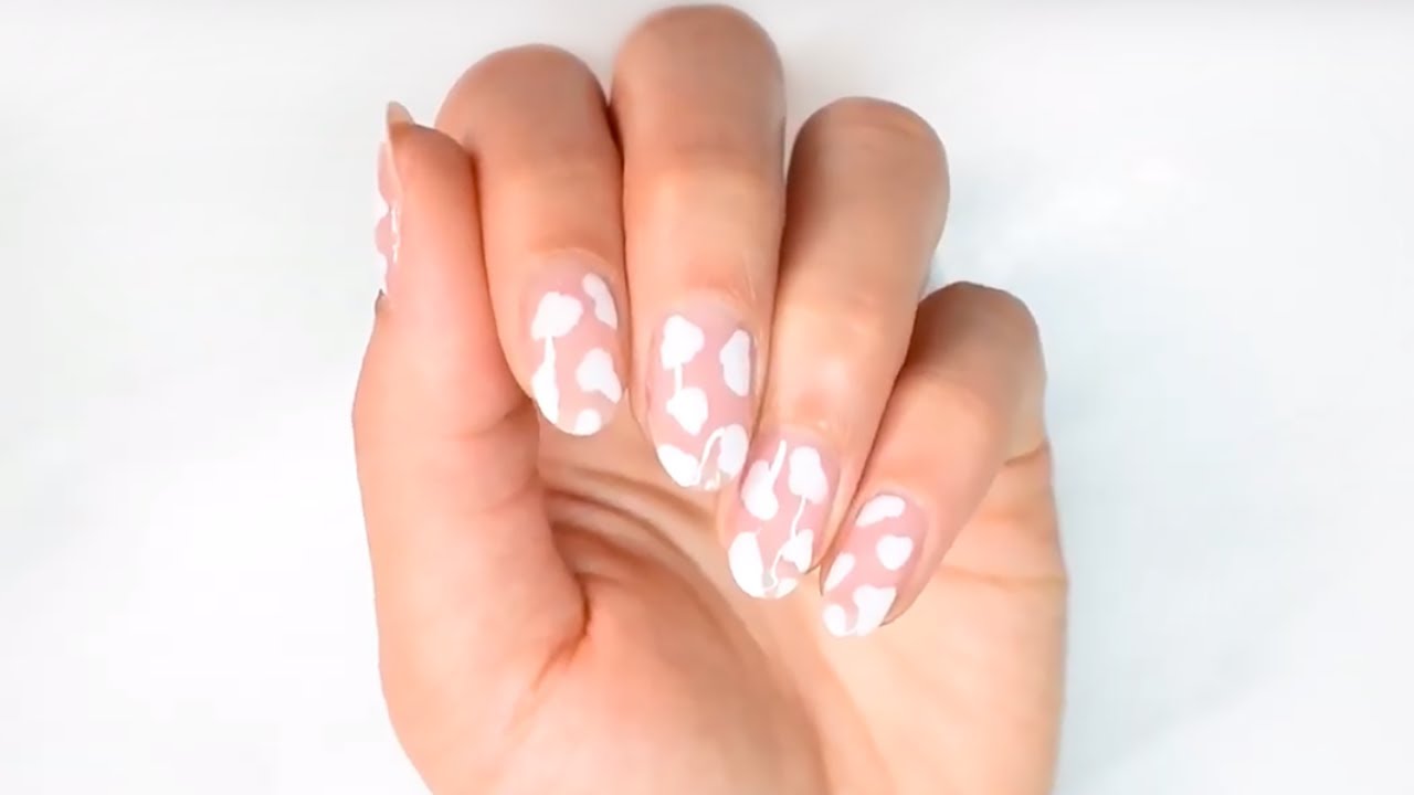 5. Step-by-Step Guide to Achieving Perfect Cow Print Nails - wide 9