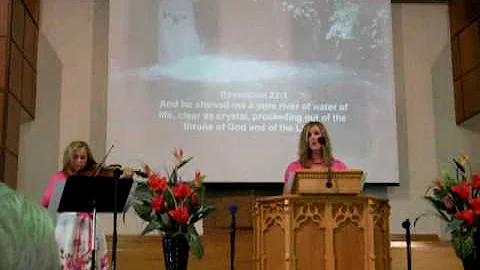 Me singing I Can Hear Your Voice in church