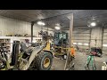 Disassembly: Part 1 replacing center pins and bearings on a John Deere 624k payloader
