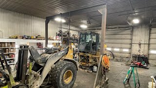 Disassembly: Part 1 replacing center pins and bearings on a John Deere 624k payloader