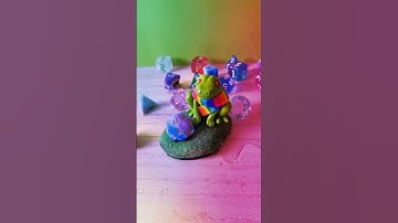 I had to 🐸🏳️‍🌈 #dice #d20 #dnd #frogs #gayfrogs #polymerclay
