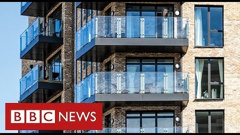 People living in blocks with flammable cladding face safety delays and huge costs - BBC News