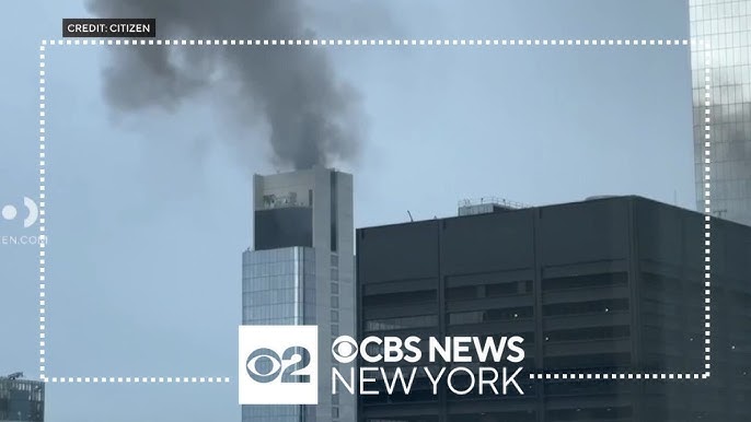 Fire On Roof Of Financial District Building