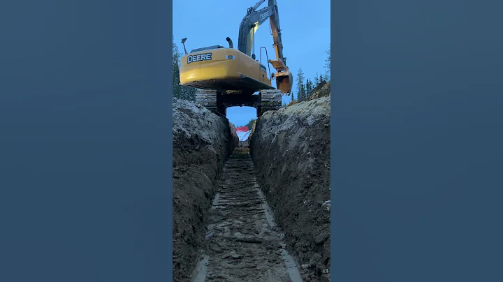 Hopping Off Ditch in an Excavator