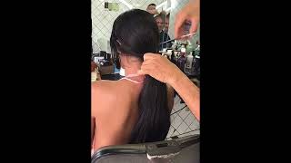 Girl long to short haircut in Barbershop