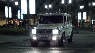 white G55 AMG Mercedes-Benz drive by Dubai Marina