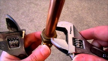 Making a 15mm nut and olive compression joint on copper pipe
