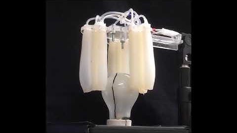 Custom Soft Robotic Gripper Sensor Skins for Haptic Object Visualization