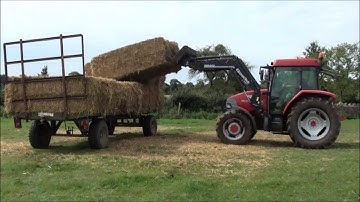 Unloading big bale wheat straw Part 2