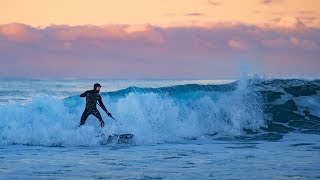 Winter surfing in the Arctic - Lofoten Islands - Norway