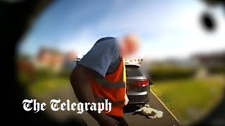 video: Watch: Postman kicks dog across garden