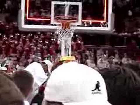 Cutting Down a Basketball Net after Clinched Big T...