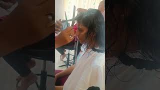 Haircut and Head massage Service Going on in Female beauty parlor by Female Staff