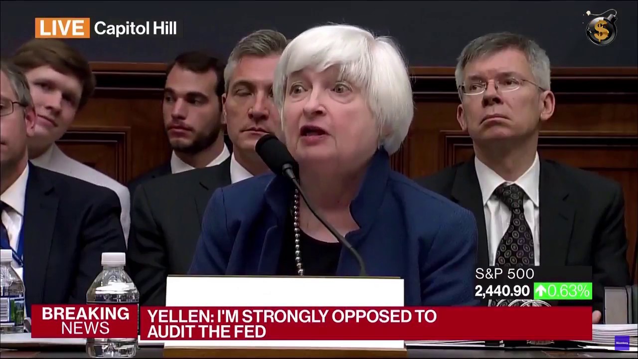 Man Holds Up Buy Bitcoin Sign as Yellen Says How FED Shoudn't Be Audited