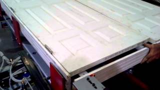 Copy of Putting a double door together on an assembly tabl