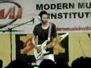 Paul Gilbert playing Scarified during a guitar clinic at 3X Music CafÃ¨ in Bedizzole (BS - Italy) organized by MMI Modern Music Institute.