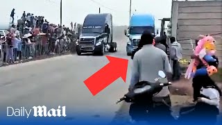 Terrifying moment truck plows into spectators killing three people during street race in Mexico