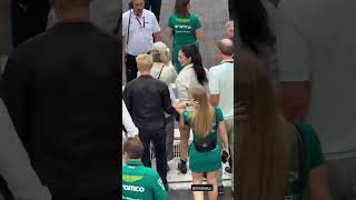 TWICE TZUYU and Stray Kids Bang Chan meeting and high fiving at the Singapore Grand Prix