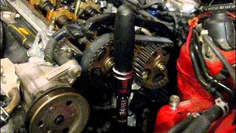 How to Replace a Honda Prelude Timing Belt - 10 of 12 - Timing Belt Tension Adjustment