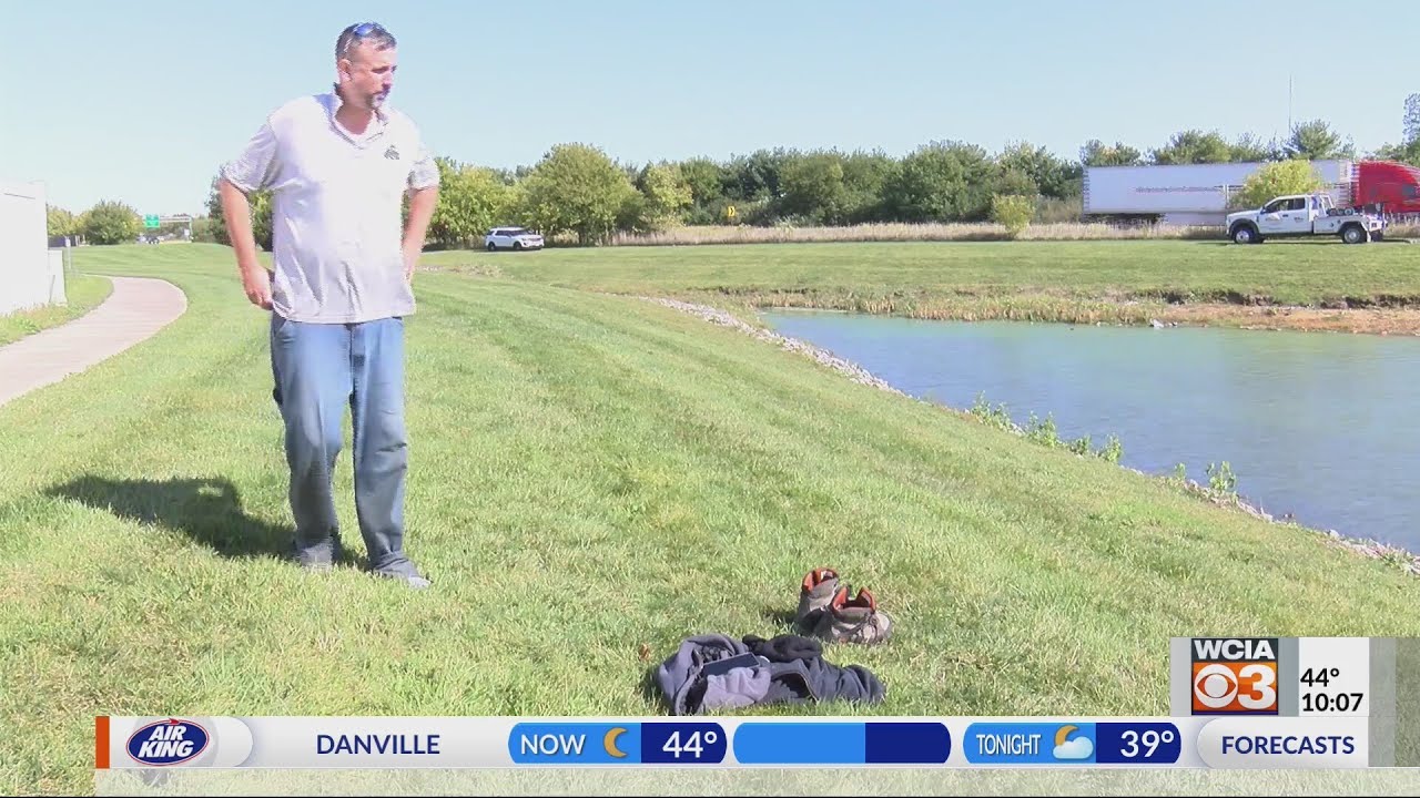 Truck drives off I-57, goes into Champaign pond