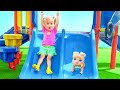 Alice and Baby Doll play on the Outdoor Playground