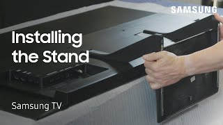 Unpacking and installing your 55” Samsung S90D TV stand | Samsung US